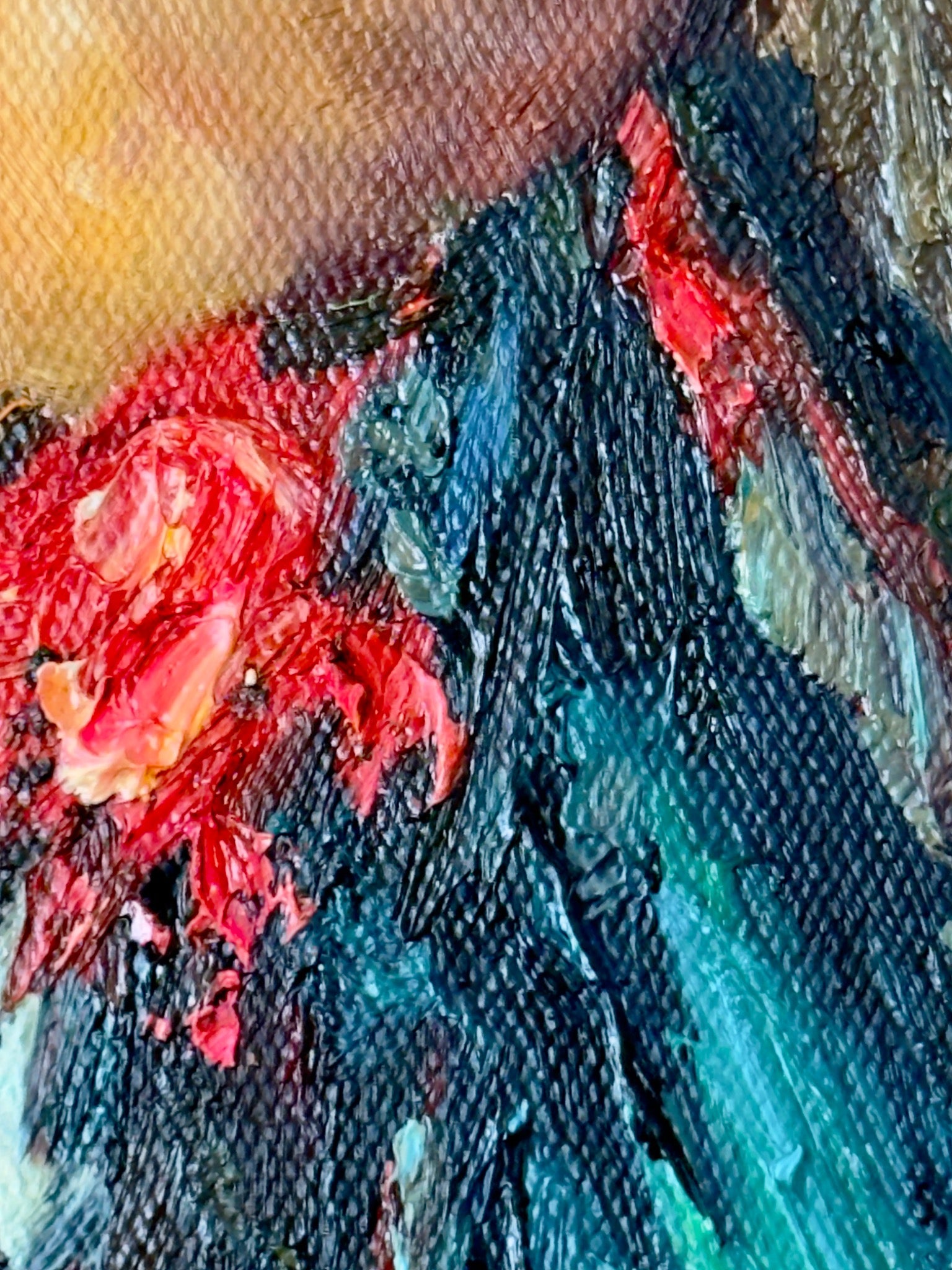 Close view of red fabric and blue-green paint rendered as tactile raised brushstrokes