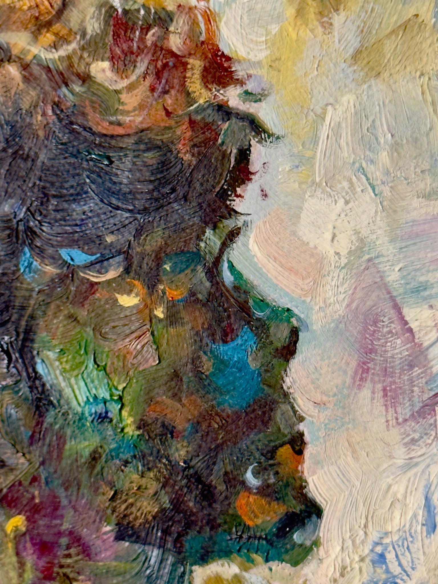 Close painting detail of vivid red, gold and orange brushwork
