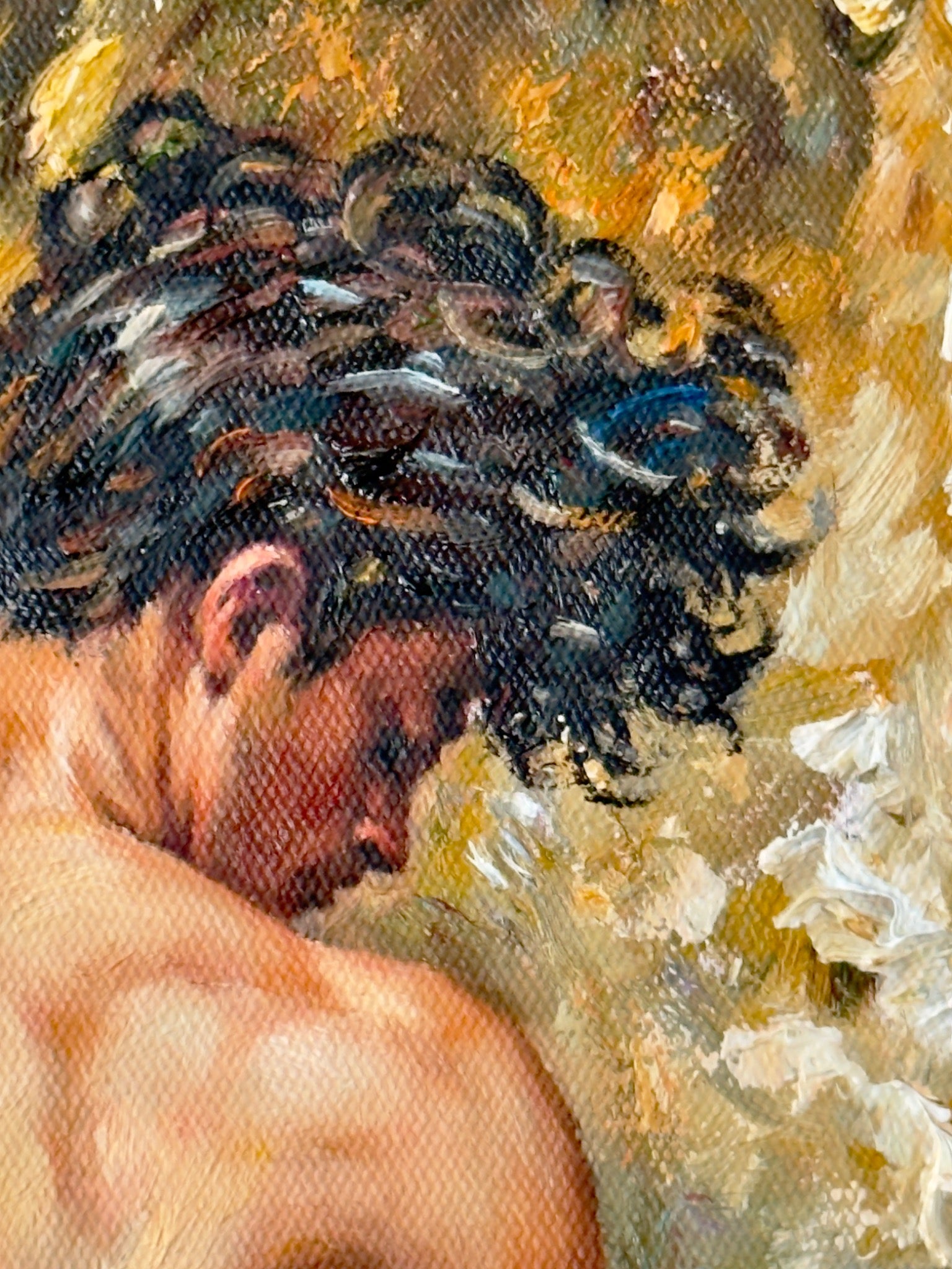 Close view of the dancer's turned face, dark curled hair and painted light